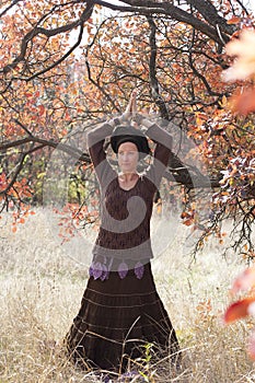 Young woman dancing ritual magic dance
