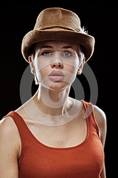 Young woman on a dark background