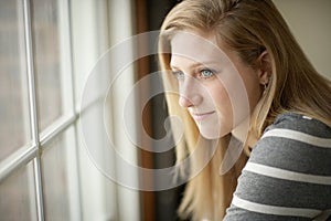 Young woman daydreaming photo
