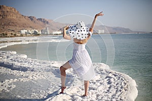 Young woman on Dead Sea