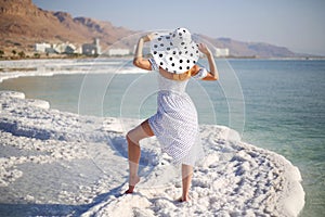 Young woman on Dead Sea