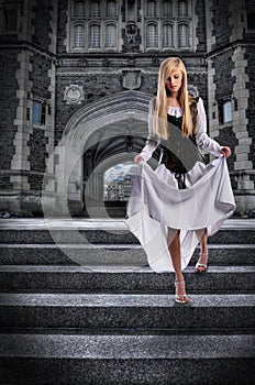 Young Woman Descending Steps of Castle