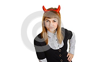 Young woman with devil horns, sly looks