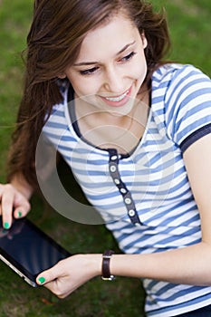 Young woman with digital tablet