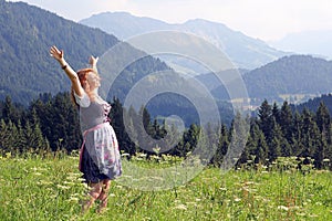 A young woman in the dirndl
