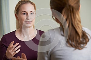 Young Woman Discussing Problems With Counselor photo