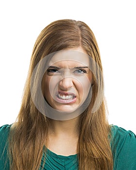 Young woman with a disgusting face