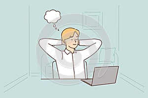 Young woman distracted from computer work dreaming