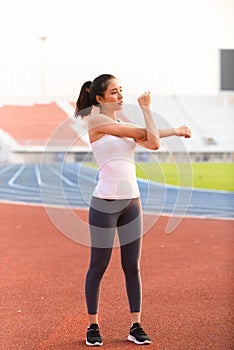 Young woman do stretch before sport