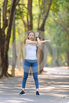 Young woman do stretch before sport