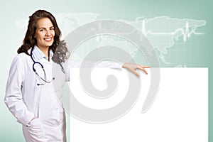 Young woman doctor with a blank banner