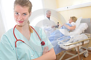Young woman doctor standing in hospital