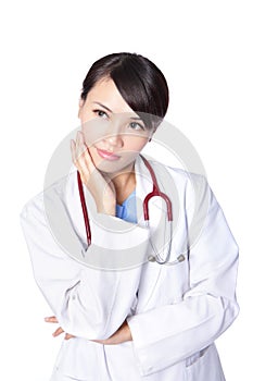 Young woman doctor thinking