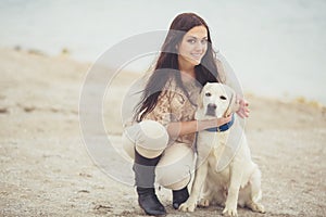 Young woman, dog labrador