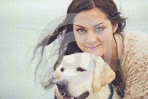Young woman, dog labrador
