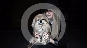 Young woman with a dog, lifestyle portrait