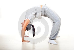 Young woman doing back bend