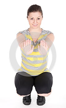 Young woman doing fitness exercises isolated on white background