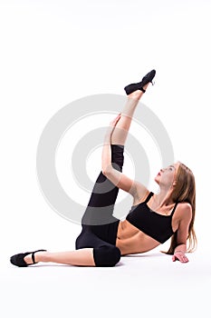 Young woman doing gymnastic exercise