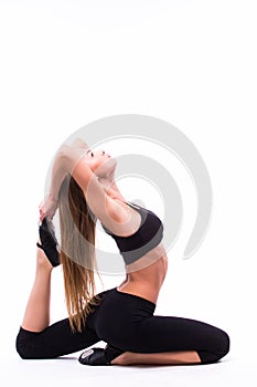 Young woman doing gymnastic exercise
