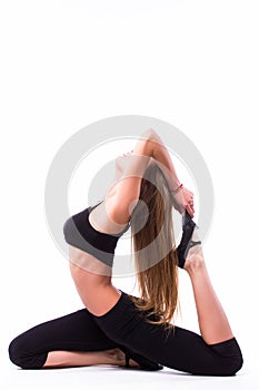 Young woman doing gymnastic exercise