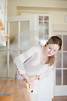 Young woman doing housework