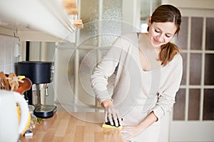 Young woman doing housework