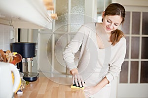 Young woman doing housework photo