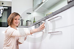 Young woman doing housework