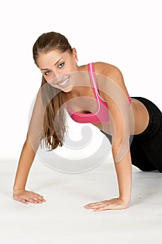 Young Woman Doing Inverted Pushup