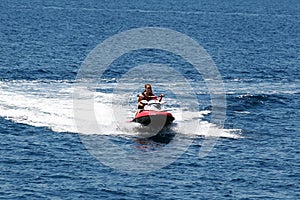 Young woman doing jet skiing