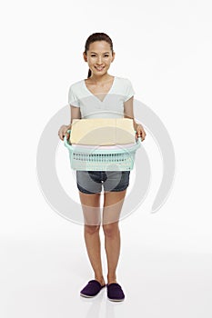 Young woman doing the laundry