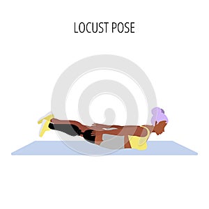 Young woman doing locust pose yoga workout