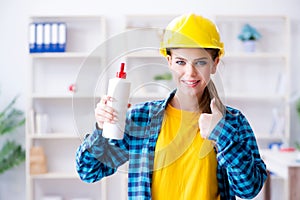 The young woman doing painting at home