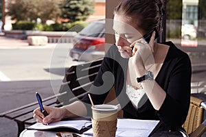 Young woman doing paperwork