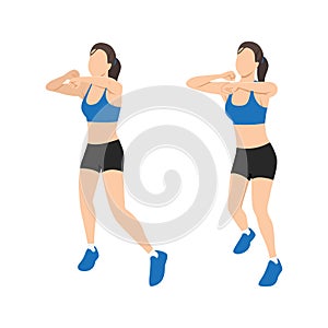 Young woman doing punching exercises. Fitness woman working on martial arts punches at a gym.Female athlete training with a small