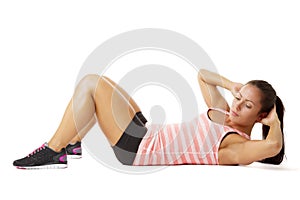 Young woman doing sit-ups