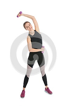 Young woman doing sports exercises isolated on white.