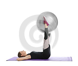 Young woman doing sports exercises isolated on white.