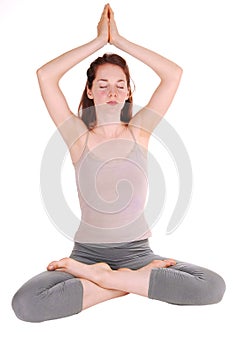 Young woman doing yoga.