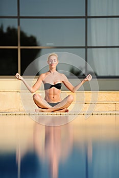 The young woman doing yoga