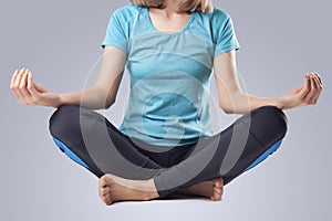 young woman doing yoga