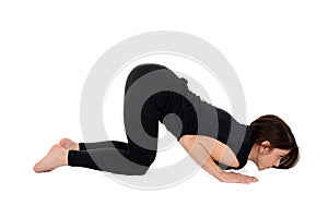 Young woman doing yoga asana Astangasana eight limb pose