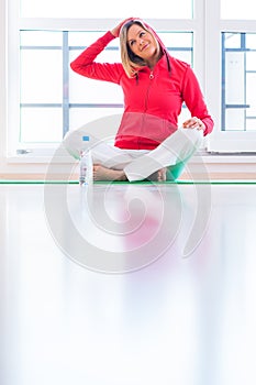 Young woman doing YOGA exercise at home