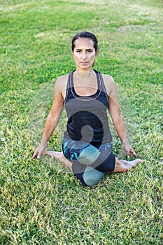 A Young woman doing yoga exercise outdoor