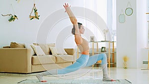 Young woman doing yoga exercise for stress relief relaxing from work