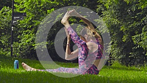 Young woman doing yoga exercises