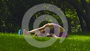 Young woman doing yoga exercises