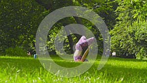 Young woman doing yoga exercises