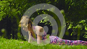 Young woman doing yoga exercises